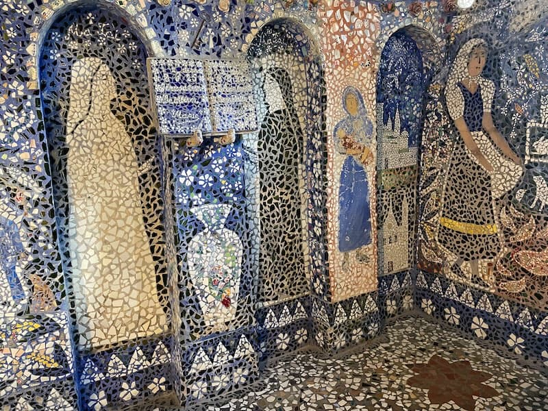 Two women made of mosaics on the walls of Maison Picassiette in Chartres, France