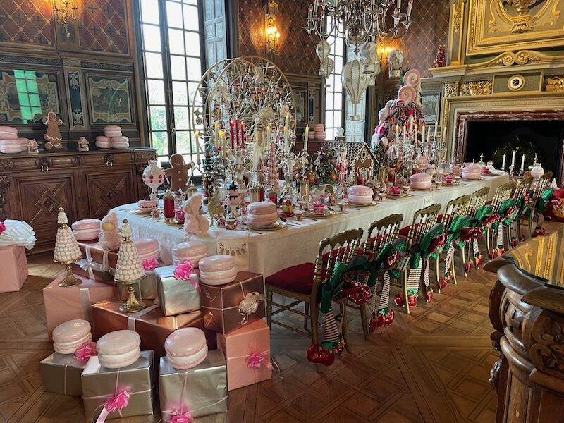 Dining room table at Cheverny Castle heaving with Christmas decorations