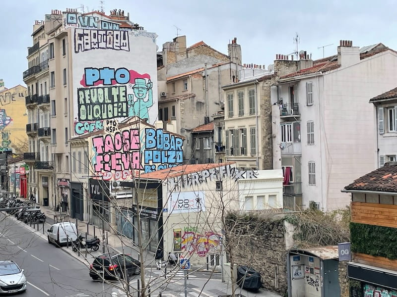 Marseille street filled with graffiti.