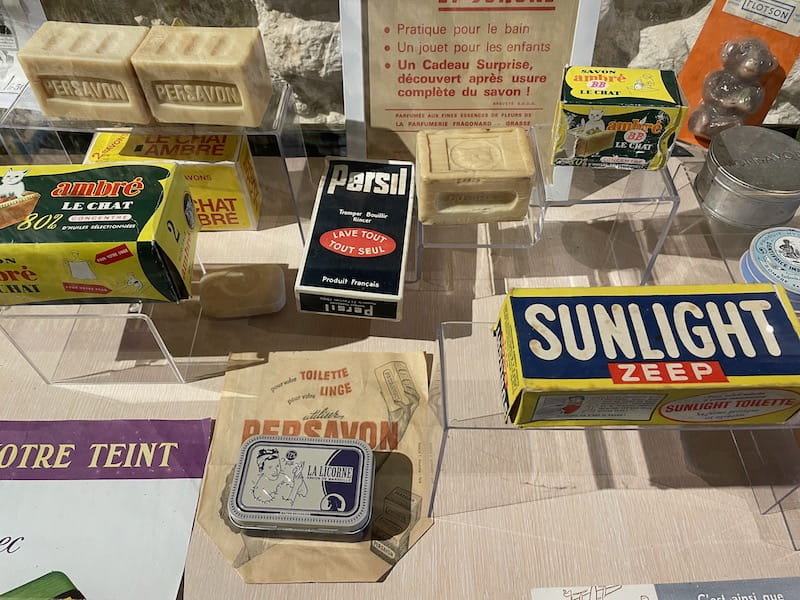 Exhibit at Musee du Savon in Marseille that shows old-fashioned Marseille soap brands.