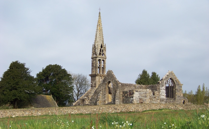 Crumbling old church and steeple in Brittany