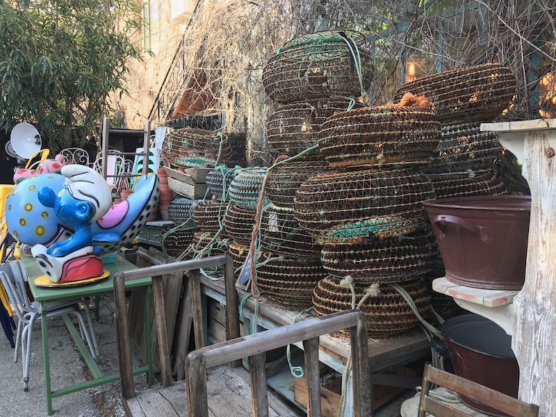 Antiques spread out in one of the six Antique Villages in Isle-sur-la-Sorgue, Provence